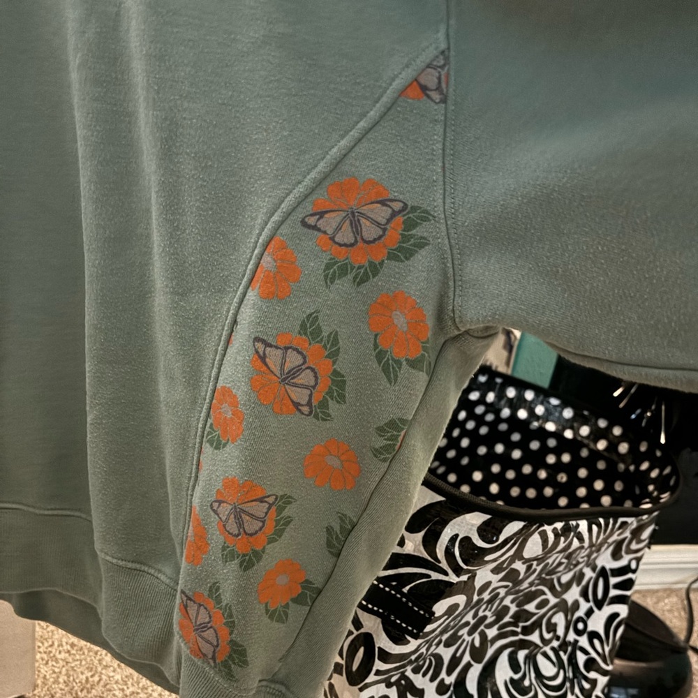 green crew neck with flowers